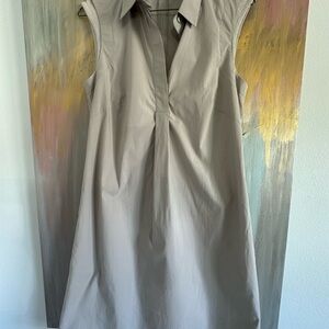 Dress fits size 2-4. Lightweight classy tan material. Peserico brand.